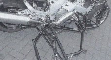 Sidecar frame and front wheel suspension